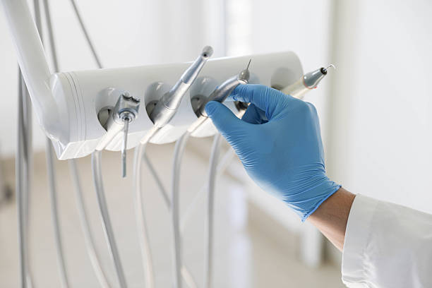 Professional Invisalign Clear Aligners technician working in Pensacola Station, FL
